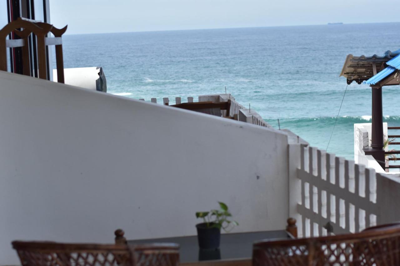 Packbag Beach Hotel Kovalam Buitenkant foto