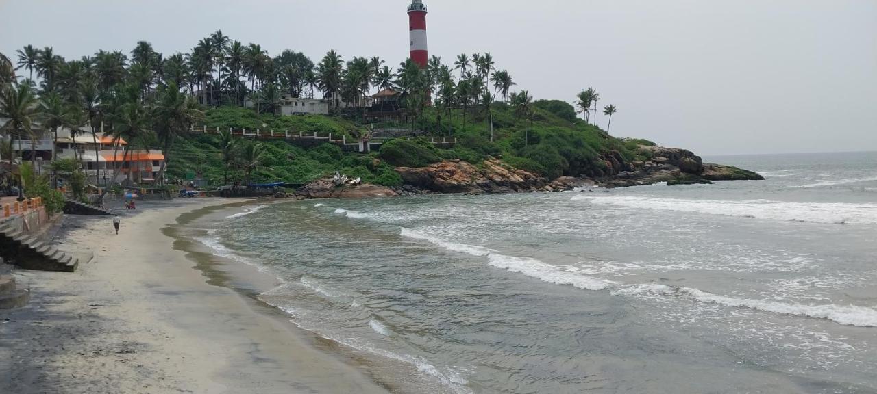 Packbag Beach Hotel Kovalam Buitenkant foto
