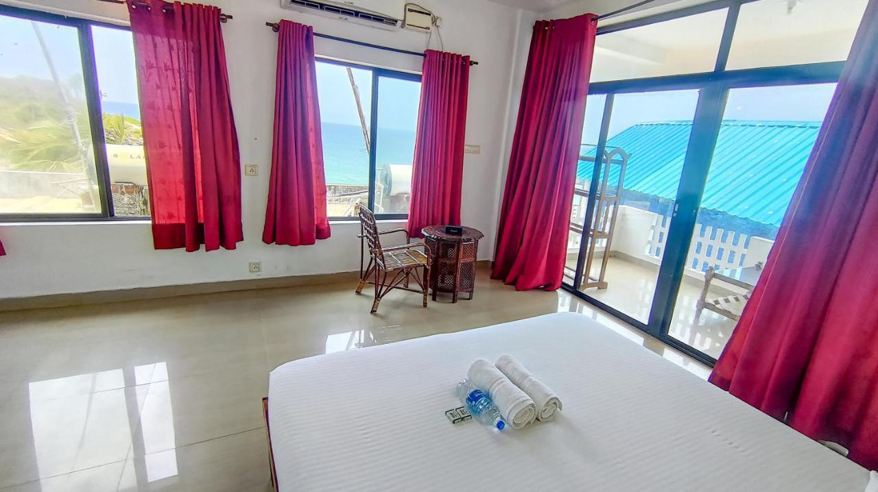 Packbag Beach Hotel Kovalam Buitenkant foto